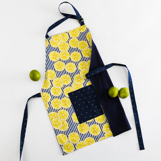 Yellow lemons on blue kids apron