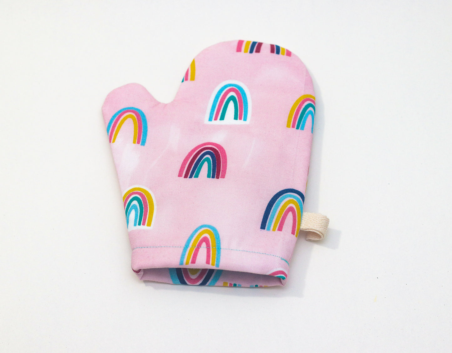 Rainbows on pink kids oven mitt and potholder