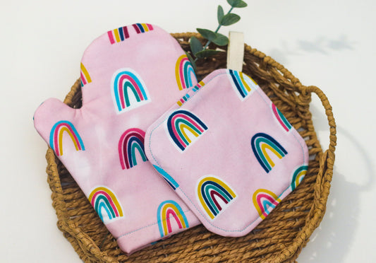 Rainbows on pink kids oven mitt and potholder